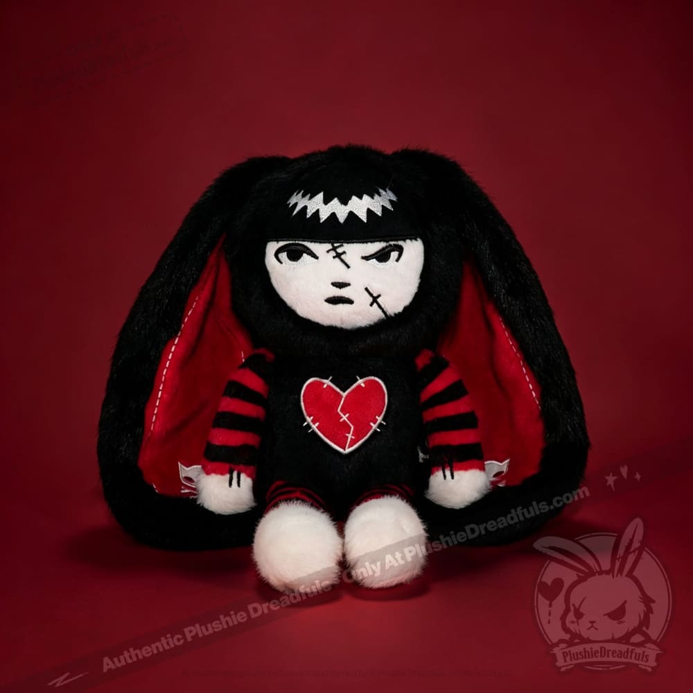 Autographed Emily the Strange and Plushie Dreadful Rabbit collaboration collector set with a black and red goth bunny plush toy, an I Love Cats canvas tote bag, ink pen, coin purse, and signed card by American McGee and Rob Reger.