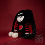 Autographed Emily the Strange and Plushie Dreadful Rabbit collaboration collector set with a black and red goth bunny plush toy, an I Love Cats canvas tote bag, ink pen, coin purse, and signed card by American McGee and Rob Reger.