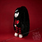 Autographed Emily the Strange and Plushie Dreadful Rabbit collaboration collector set with a black and red goth bunny plush toy, an I Love Cats canvas tote bag, ink pen, coin purse, and signed card by American McGee and Rob Reger.