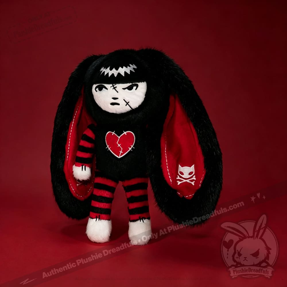 Autographed Emily the Strange and Plushie Dreadful Rabbit collaboration collector set with a black and red goth bunny plush toy, an I Love Cats canvas tote bag, ink pen, coin purse, and signed card by American McGee and Rob Reger.