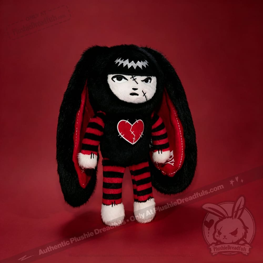 Autographed Emily the Strange and Plushie Dreadful Rabbit collaboration collector set with a black and red goth bunny plush toy, an I Love Cats canvas tote bag, ink pen, coin purse, and signed card by American McGee and Rob Reger.