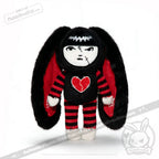 Limited edition Emily the Strange Plushie Dreadfuls plush toy with black bunny ears, striped outfit, and a broken heart chest.