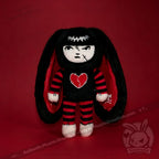 Autographed Emily the Strange and Plushie Dreadful Rabbit collaboration collector set with a black and red goth bunny plush toy, an I Love Cats canvas tote bag, ink pen, coin purse, and signed card by American McGee and Rob Reger.