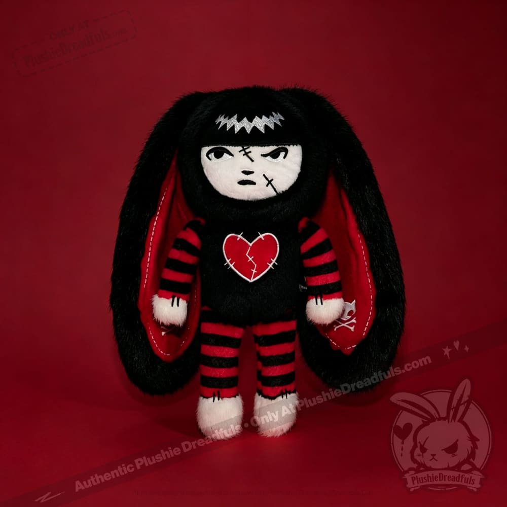 Autographed Emily the Strange and Plushie Dreadful Rabbit collaboration collector set with a black and red goth bunny plush toy, an I Love Cats canvas tote bag, ink pen, coin purse, and signed card by American McGee and Rob Reger.