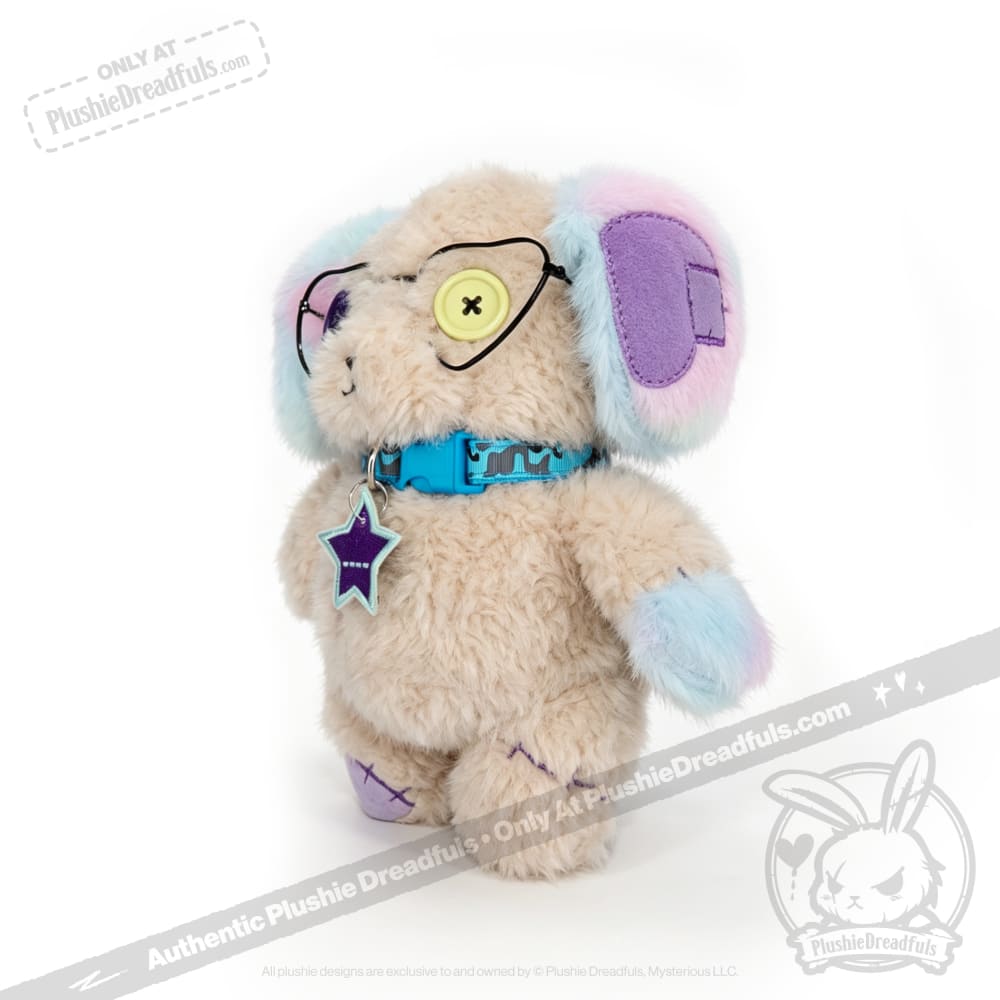 Emotional Neglect Puppy from Plushie Dreadfuls: pastel plush with glasses, button eye, blue collar, and star tag.