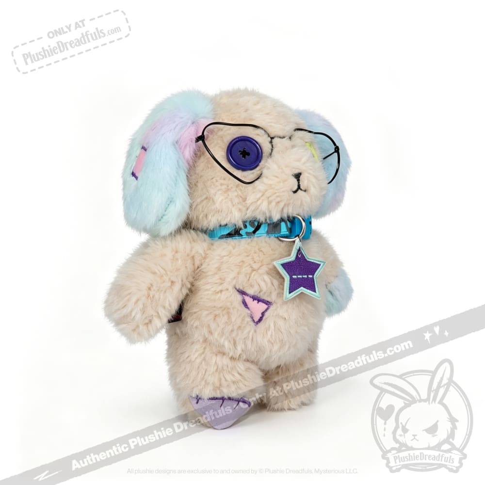 Emotional Neglect Puppy from Plushie Dreadfuls: plush dog toy with pastel ears, button eye, and star charm.