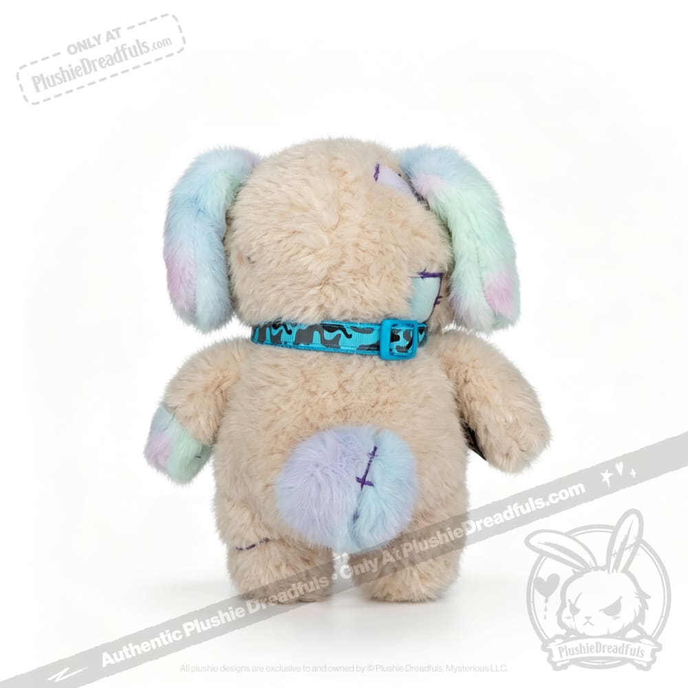 Plushie Dreadfuls Emotional Neglect Puppy with pastel patches and blue collar, available at plushiedreadfuls.com.
