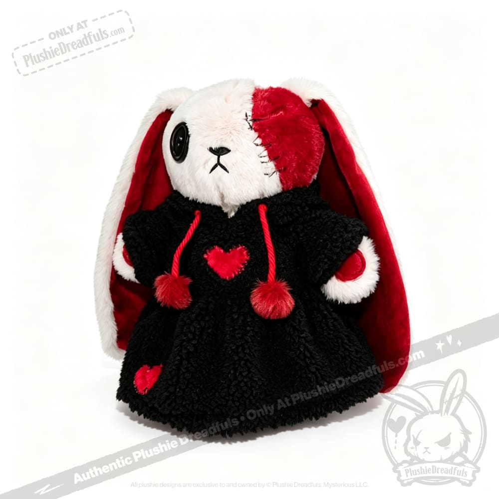 Plushie Dreadfuls bunny with mismatched eyes, black dress with red hearts, and red-lined ears.