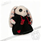 Plushie Dreadfuls bunny with button eyes, plaid ears, and a plushie hoodie with red hearts, standing upright.