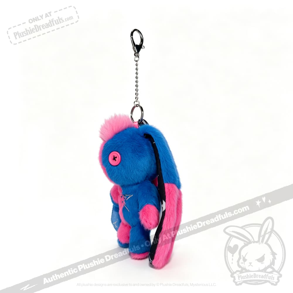Gemini Rabbit plush blue and pink bunny keychain with button eyes, zipper belly, and metal clip against a white background.
