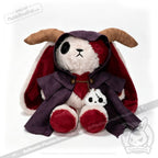 Horned Cloak bunny plushie, in a purple cloak, cuddles a smaller Plushie Dreadfuls companion against a white background.