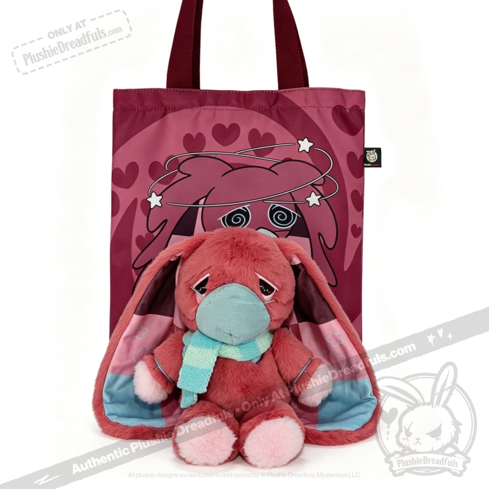 Plush pink awareness rabbit with long ears and scarf sits by a pink tote bag—thoughtful chronic illness gift.