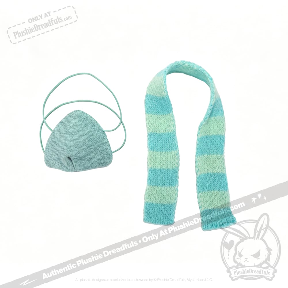 A blue knit face mask and blue-and-white striped scarf—perfect as a chronic illness gift or Long COVID plushie accessory.