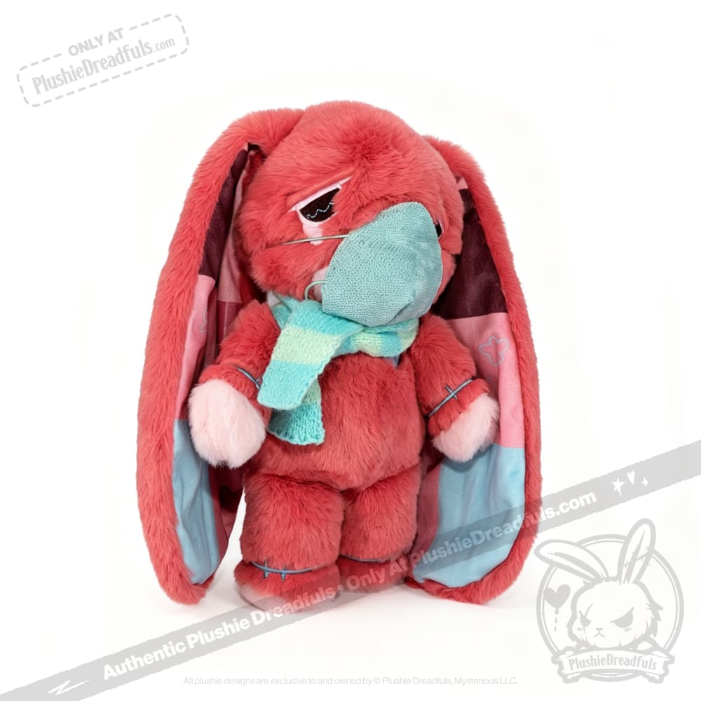 A pink plush bunny with long ears, a teal scarf, and blue eye patch—an ideal awareness rabbit for chronic illness gifts.