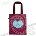 Maroon tote bag with stitched edges, blue heart, and swirling maroon hearts—perfect as a chronic illness gift.