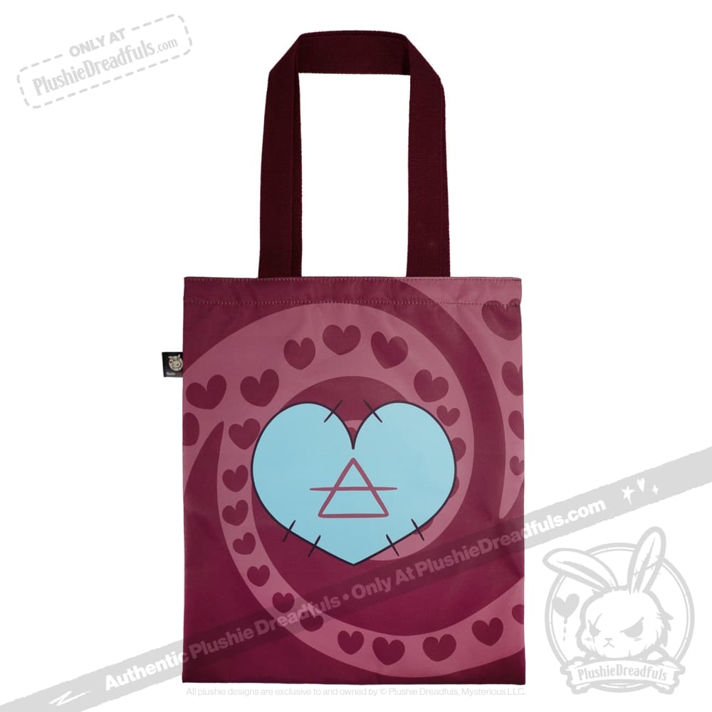 Maroon tote bag with stitched edges, blue heart, and swirling maroon hearts—perfect as a chronic illness gift.