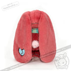 A plush pink bunny hood with long ears, a broken blue heart patch—perfect as a chronic illness gift.