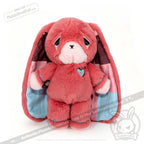 Pink plush bunny with long ears and a heart patch—an adorable awareness rabbit for any chronic illness gift or collection.