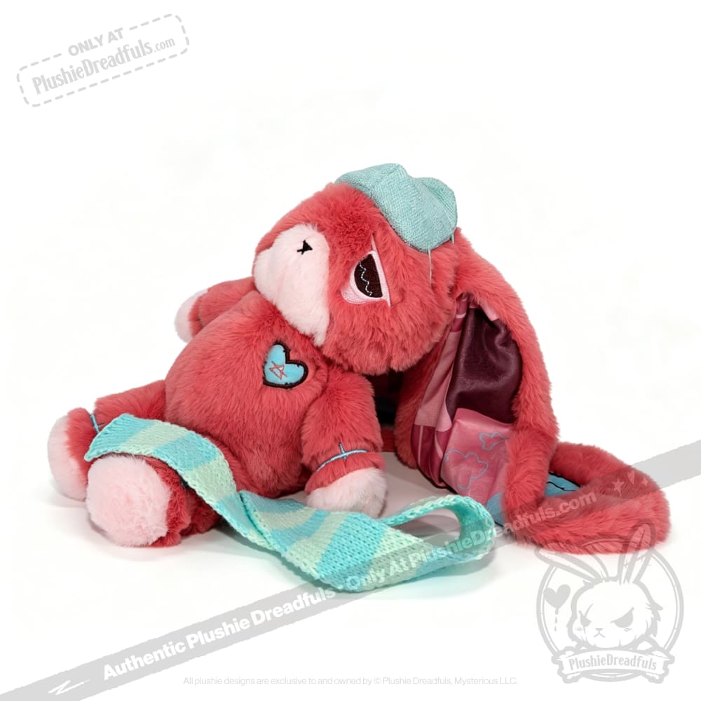 Pink plush bunny with teal hat and scarf, perfect as a chronic illness gift or Long COVID plushie, on a white background.