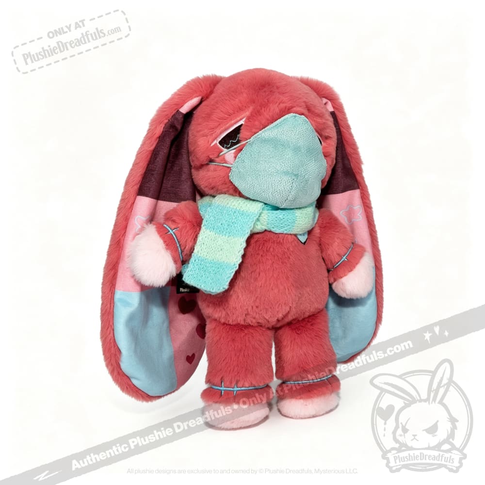 Plush pink bunny with long ears, a blue mask, and striped scarf—perfect as a Long COVID plushie or chronic illness gift.