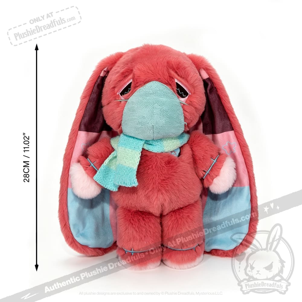 Pink plush bunny with droopy ears, a teal mask and scarf—perfect as a Long COVID plushie or chronic illness gift.