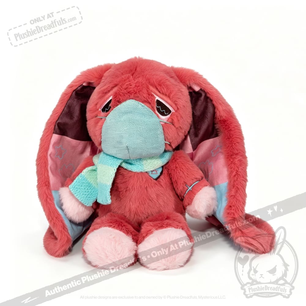 Plush pink bunny with droopy ears, blue mask and scarf—an awareness rabbit perfect as a Long COVID plushie gift.