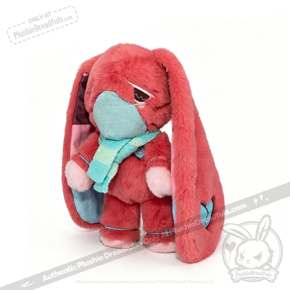 Pink plush bunny with long ears, blue face mask and scarf—an awareness rabbit plushie for chronic illness or Long COVID.