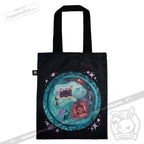Black tote bag with a cute, glowing turtle amid stars—perfect for fans of zodiac stuffed animal designs.