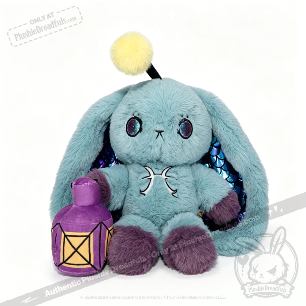 Plushie Dreadfuls Pisces Rabbit plush: blue bunny with purple lantern, zodiac stuffed animal with yellow pompom on head.
