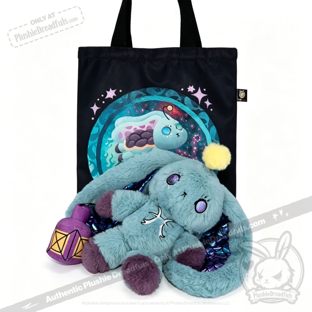 Plushie Dreadfuls Pisces Rabbit plush with sparkly ears holds a lantern in front of a magical creature tote bag.