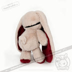 Plushie Dreadfuls bunny with long ears, red details, and feet, shown from the back on a white background.