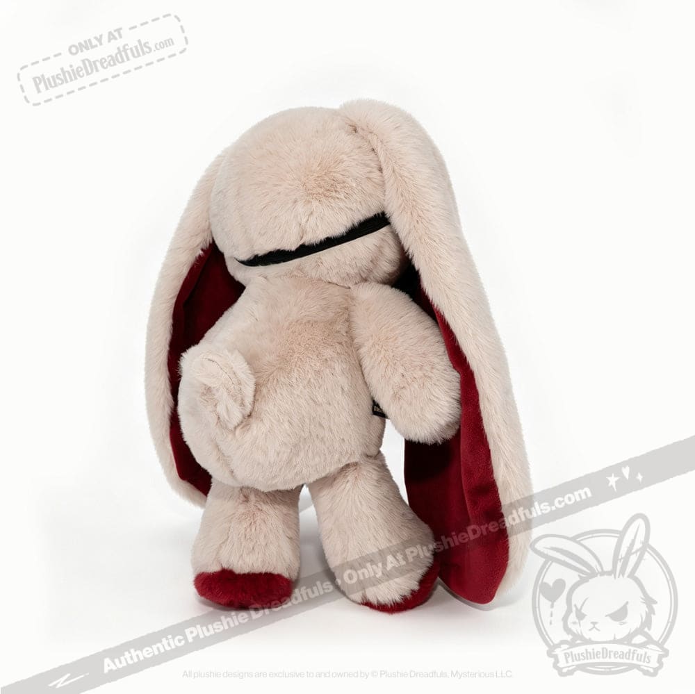 Plushie Dreadfuls bunny with long ears, red details, and feet, shown from the back on a white background.