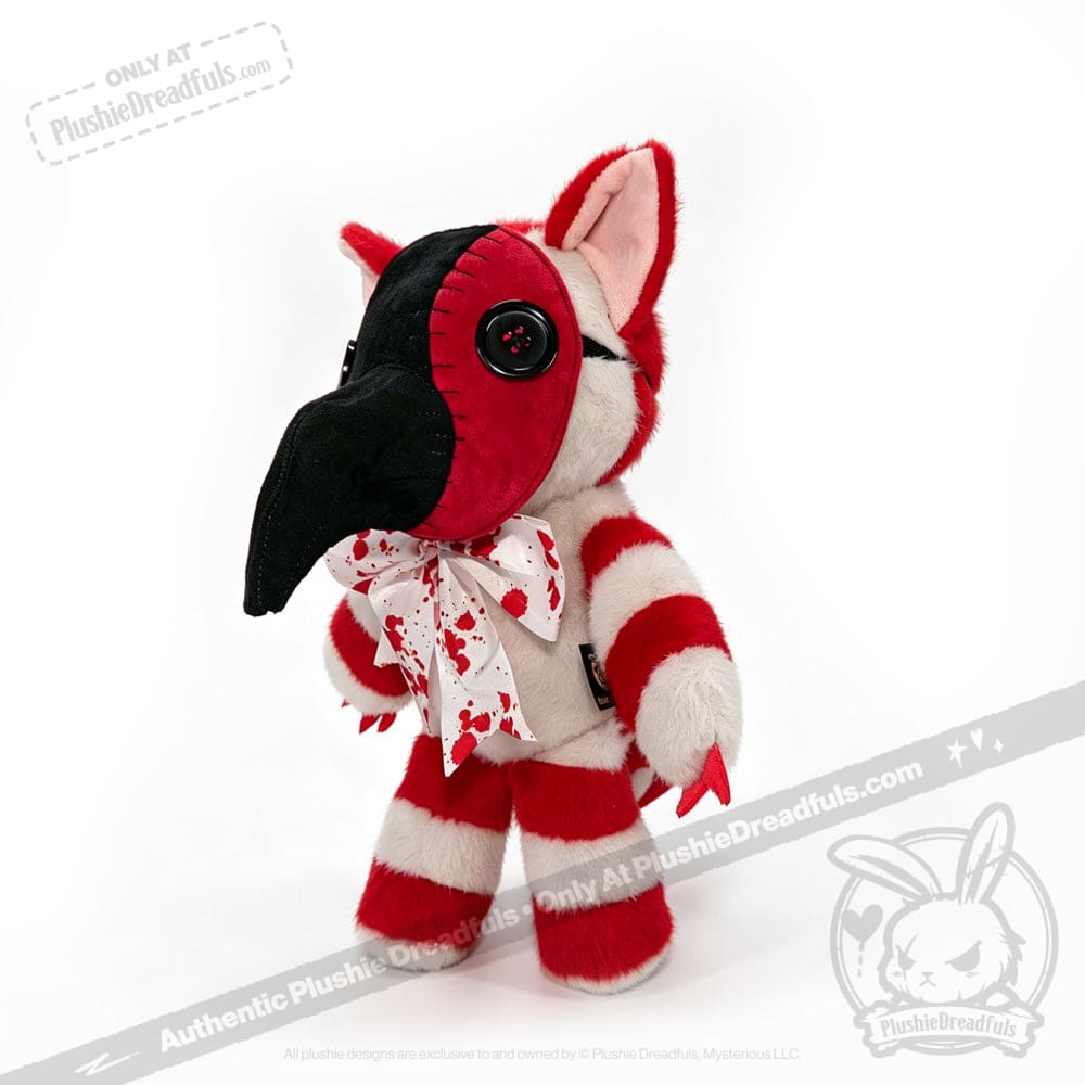 Plushie Dreadfuls toy with red stripes, button eyes, black beak like a comfy plague mask, and bow with red splatters.