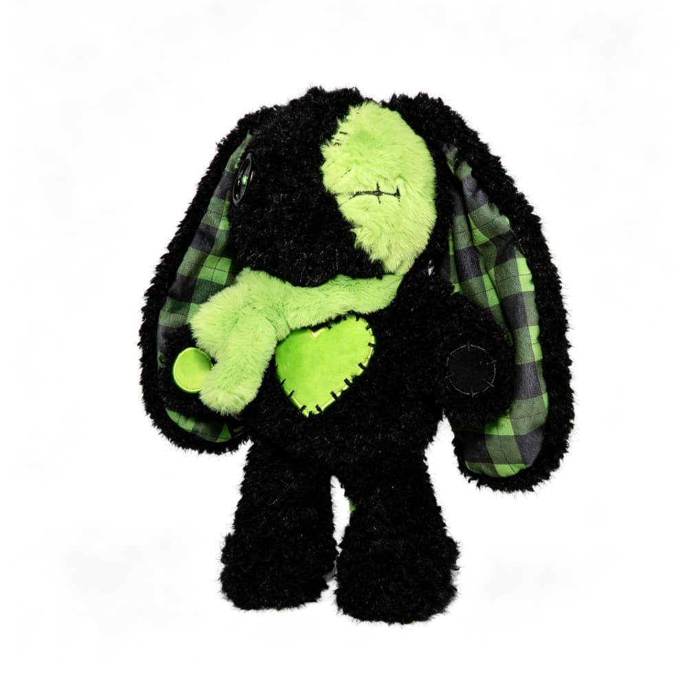 A Plushie Dreadfuls Love Rabbit: black plush stuffed animal with green accents, plaid ears, a heart patch, and a scarf.