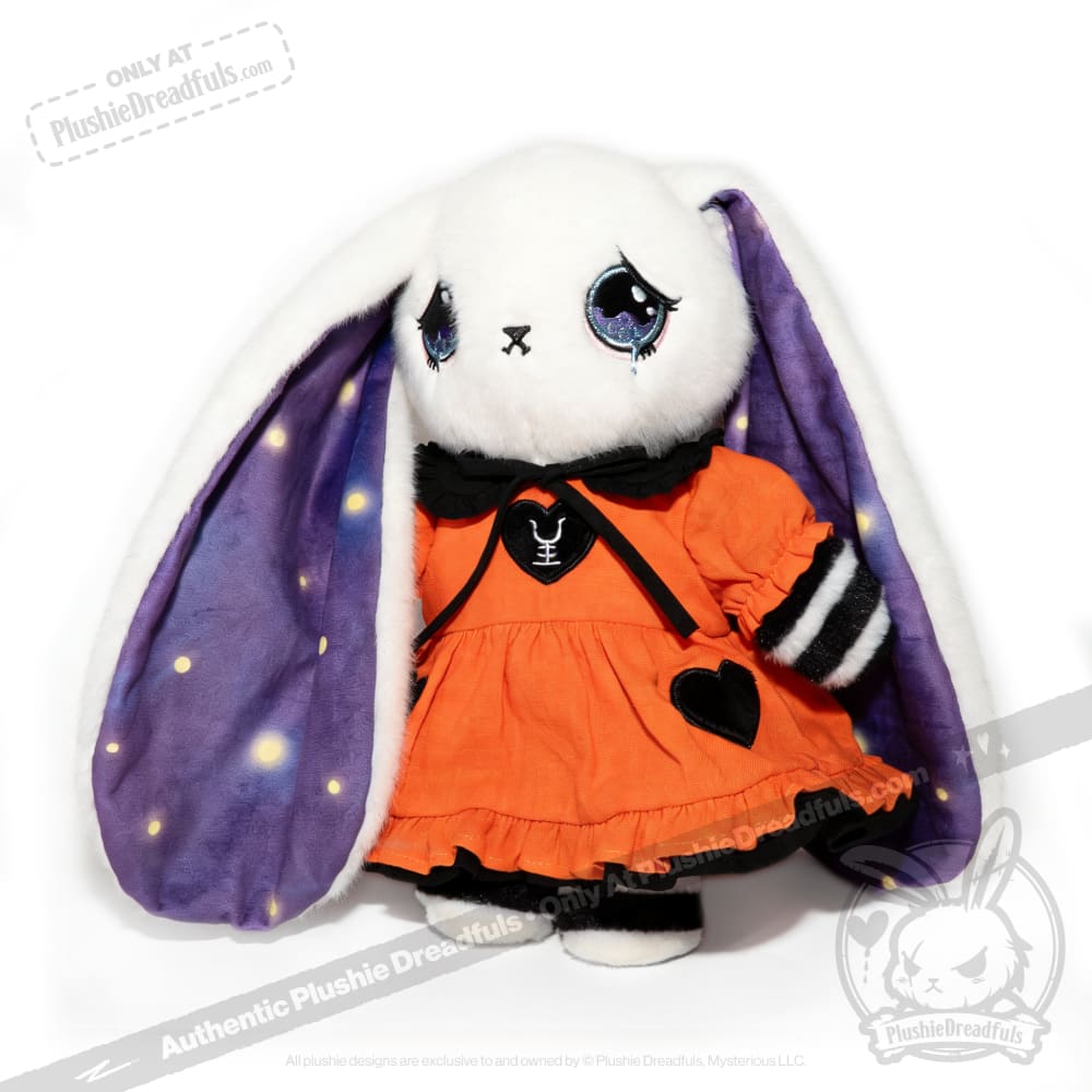 Anxiety Alice Bunny Plush with long ears, orange dress, black bow, sad blue eyes, and starry ear lining.