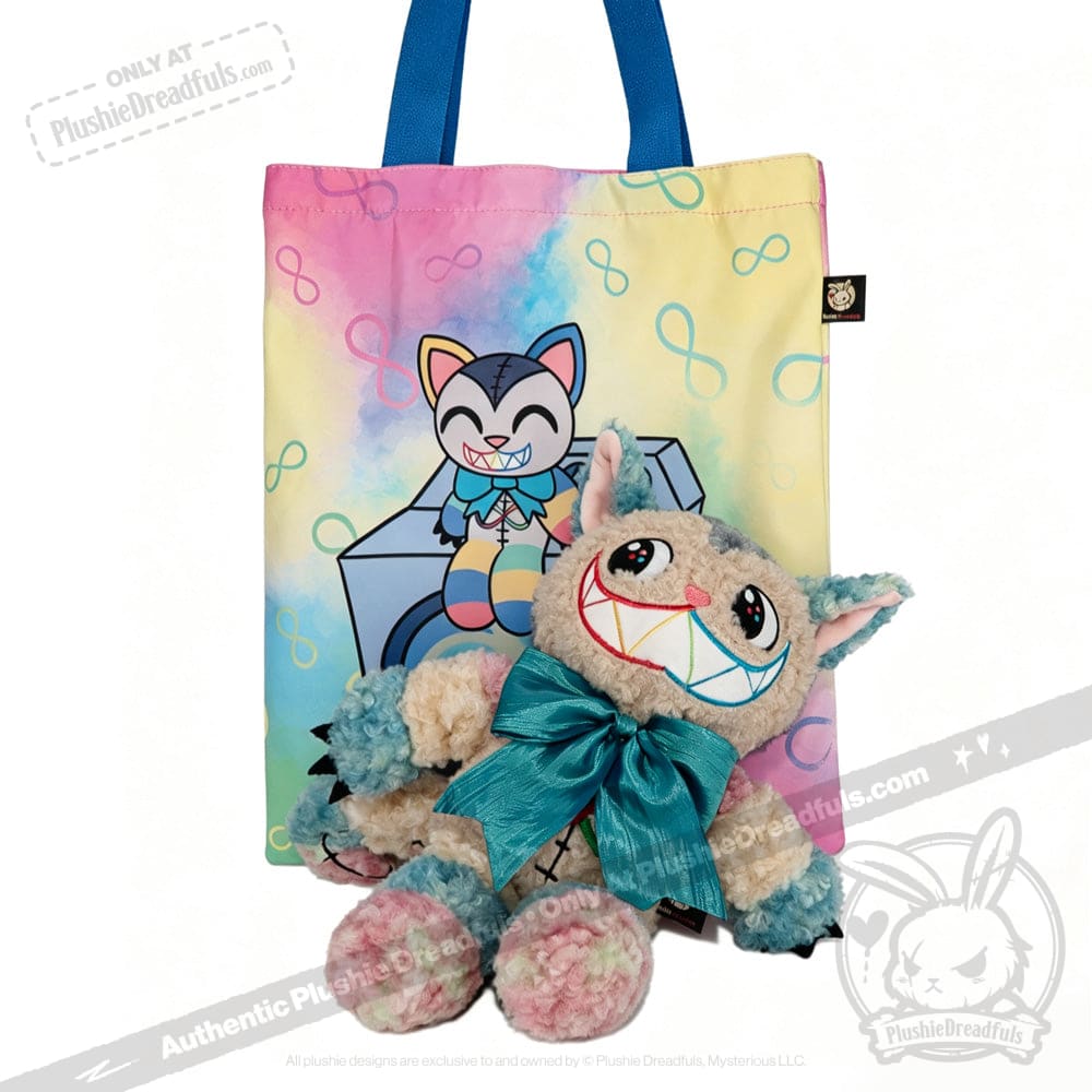 A vibrant tote bag and a plush toy—both inspired by the Victorian McGee's Autism Acceptance Cheshire Cat Plush Stuffed Animal, featuring a cartoon cat with a big bow, cheerful, multicolored smile, and playful design—celebrate autism acceptance with a whimsical Alice in Wonderland flair.