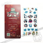 Plush Dreamers x Plushy Life collab sticker pack featuring a red card packaging and a sheet of various character stickers including Pichis, Plushies, and other anime-inspired characters on a white background.