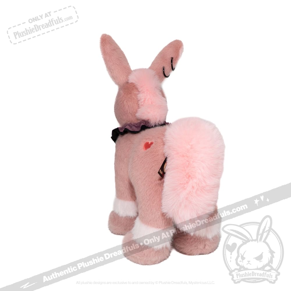 Limited edition Year of the Horse plush rabbit from plushiedreadfuls.com, with heart mark and black ruffled collar.